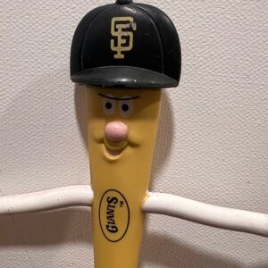 Russ Berrie Giants Figure with Yellow Body and Black Cap